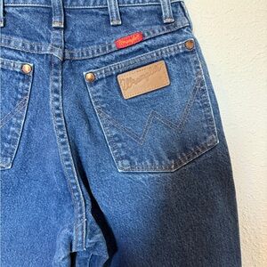 Vintage Wrangler size 26 x 29 women’s made in the USA dark wash jeans